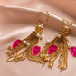 Meira Tassel Hamsa Earrings